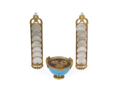 Y A PAIR OF FRENCH 'PALAIS ROYALE' ORMOLU AND MOTHER-OF-PEARL 'SERRE CARTES'  MID 19TH CENTURY 34cm high, 7cm wide AND A 'PAL