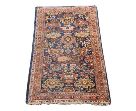 A ZIEGLER RUGapproximately 212 x 126cmCondition Report: Wear overall consistent with age and use - see images for extent. Old