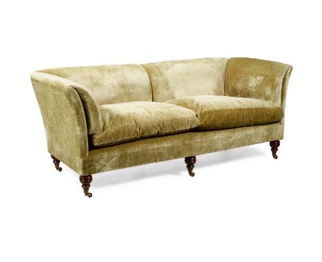 A MAHOGANY AND UPHOLSTERED SOFAIN LATE VICTORIAN STYLE, AFTER DESIGNS BY HOWARD & SONS, OF RECENT MANUFACTUREapproximately 85