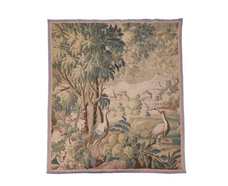 A FRENCH VERDURE TAPESTRY PANEL LATE 17TH/EARLY 18TH CENTURY A fragment of a larger wall length panel, depicting two large wa
