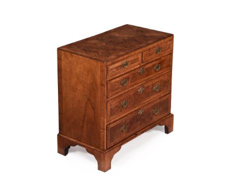 A GEORGE II BURR AND FIGURED WALNUT CHEST OF DRAWERSCIRCA 1730Incorporating fine herringbone inlay throughout74cm high, 76cm 