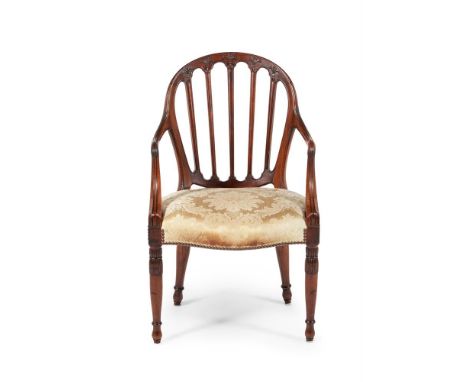 A GEORGE III MAHOGANY ARMCHAIRCIRCA 1760With serpentine shaped upholstered seat, the inside top of a back leg stamped '01529'