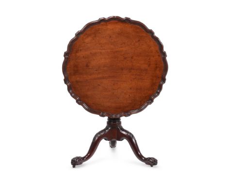 A GEORGE II MAHOGANY TRIPOD TABLECIRCA 1760The piecrust tilt top with a birdcage support, the feet with recessed casters74cm 