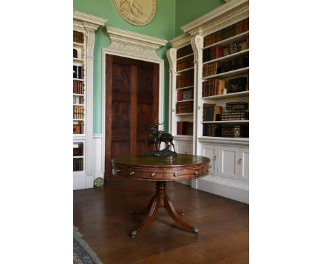 A GEORGE III MAHOGANY DRUM LIBRARY TABLE CIRCA 1800With tooled leather inset top 73cm high, the top 106cm diameter Provenance