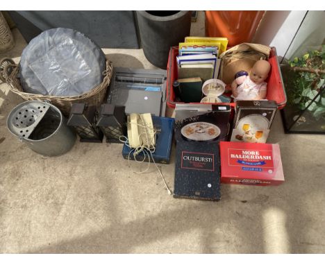 A LARGE ASSORTMENT OF ITEMS TO INCLUDE BOOKS, A TYPEWRITER AND A WICKER BASKET ETC 