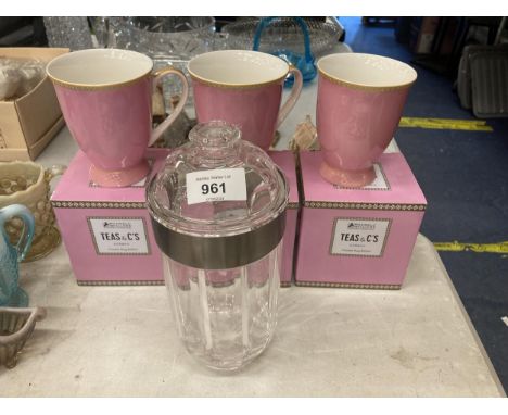 THREE NEW AND BOXED MAXWELL AND WILLIAMS 'KASBAH' FOOTED MUGS PLUS A TEA CADDY 