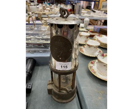 A VINTAGE 'ECCLES CR65 PROTECTOR MINERS  AND LIGHTING SAFETY LAMP' HEIGHT 23CM 