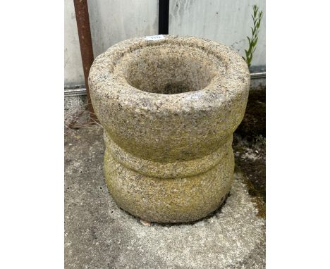 A VINTAGE INDIAN STONE MORTAR, 12" DIAMETER 