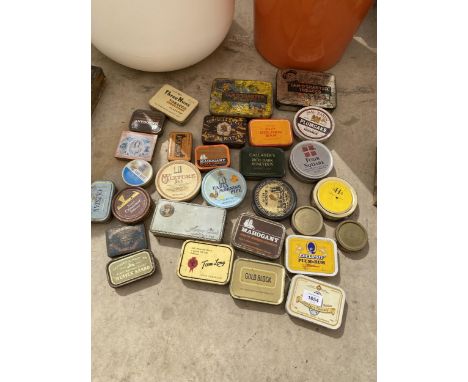 AN ASSORTMENT OF VINTAGE TINS 