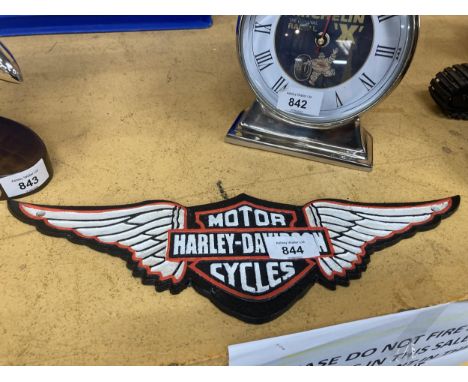 A CAST HARLEY DAVIDSON SIGN 