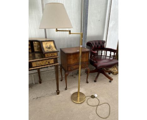 A BRASS STANDARD LAMP 