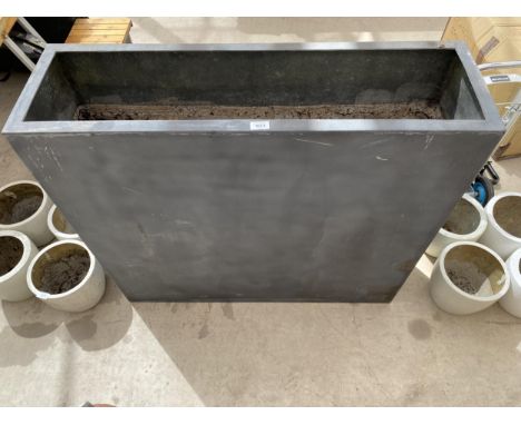 A TALL BLACK RECTANGULAR FIBRE GLASS TROUGH PLANTER (100CM x 90CM x 30CM) 