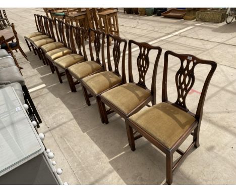 A SET OF TEN MAHOGANY CHIPPENDALE STYLE DINING CHAIRS WITH PIERCED SPLAT BACKS 