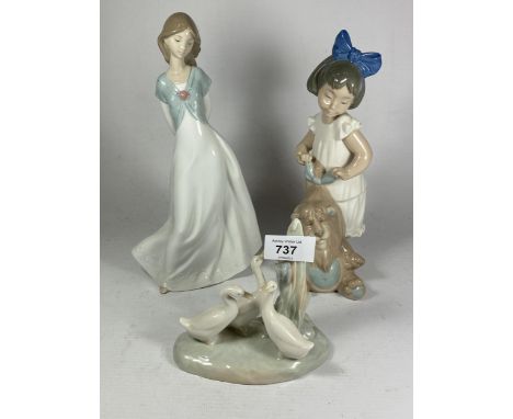 THREE NAO LLADRO FIGURES TO INCLUDE GIRL WITH DOG ETC 