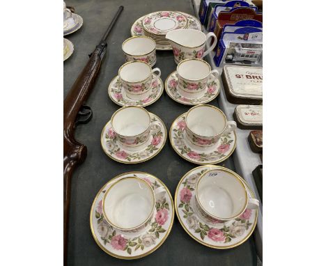A ROYAL WORCESTER 'ROYAL GARDEN' TEASET TO INCLUDE A CAKE PLATE, CREAM JUG, SUGAR BOWL, CUPS, SAUCERS AND SIDE PLATES 