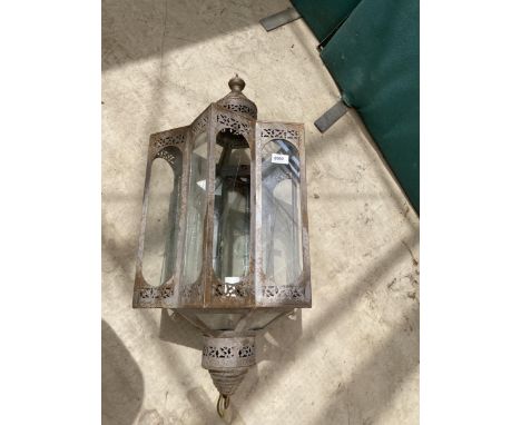 A DECORATIVE METAL INDIAN STYLE LIGHT FITTING 