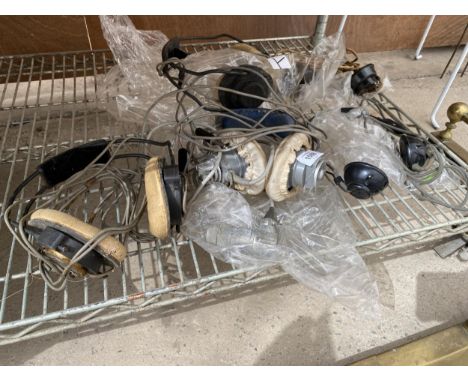 AN ASSORTMENT OF VINTAGE HEAD SETS 