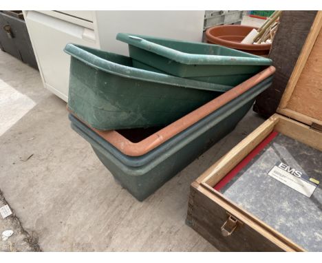 FIVE PLASTIC TROUGH PLANTERS, TWO PLASTIC PLANT POTS AND A QUANTITY OF BATTERY CANDLES ETC 