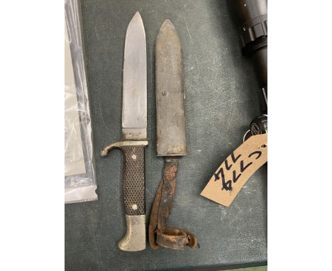 A VINTAGE GERMAN  SOLINGEN KNIFE IN SHEATH 