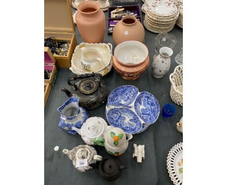 A VINTAGE LOT TO INCLUDE TEAPOTS, BLUE AND WHITE CERAMICS, VASES, A PLANTER, LARGE GOSS JUG, ETC 