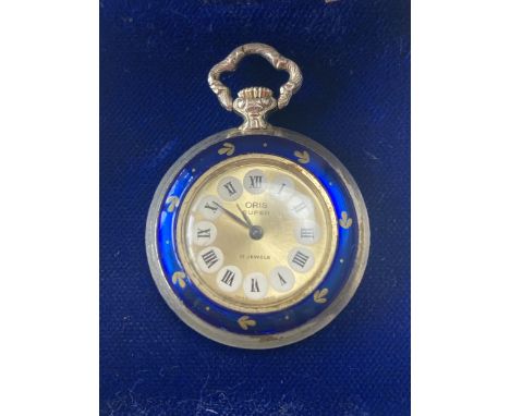 A LADIES ENAMEL FOB WATCH SEEN WORKING BUT NO WARRANTY 