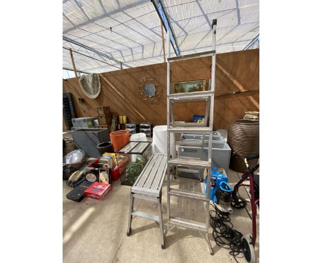 A THREE WAY FOLDING LADDER AND A BUILDERS HOP UP 