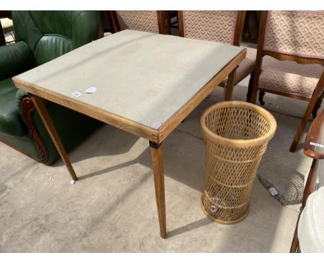 A FOLDING CARD TABLE AND WICKER STICK STAND 