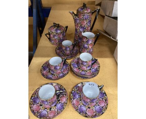 A VINTAGE COFFEE SET WITH FLORAL DESIGN AND INSECT BACK STAMP TO INCLUDE A COFFEE POT, SUGAR BOWL, CUPS AND SAUCERS 