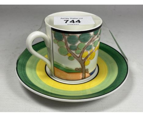 A WEDGWOOD CLARICE CLIFF SECRETS PATTERN CUP AND SAUCER 