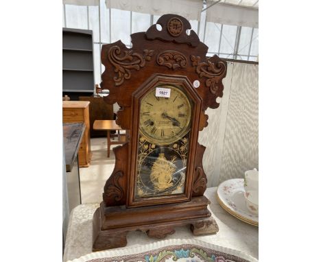 A VINTAGE 'B.YOUELL &amp; SONS' WOODEN CASED CLOCK 