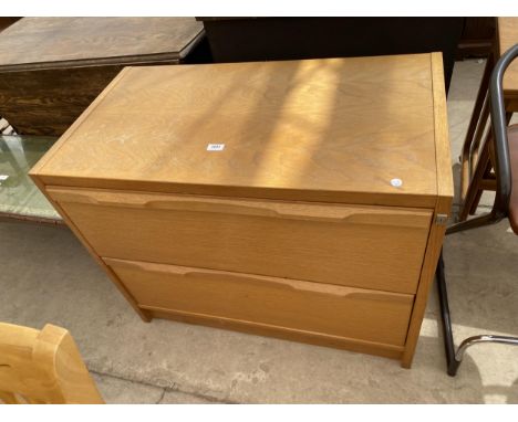 A MODERN LIGHT OAK TWO DRAWER FILING CABINET STAMPED 'MADE IN DENMARK', 36.5" WIDE 