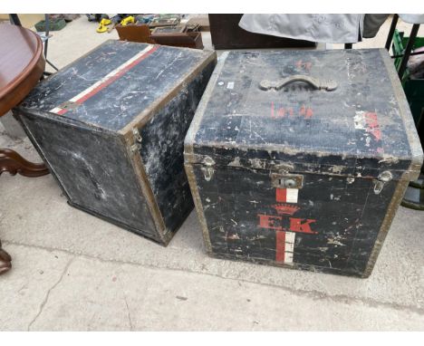 A COMPRESSED FIBRE TWO SECTION TRAVELLING TRUNK, 24" SQUARE BY 49.5" HIGH 