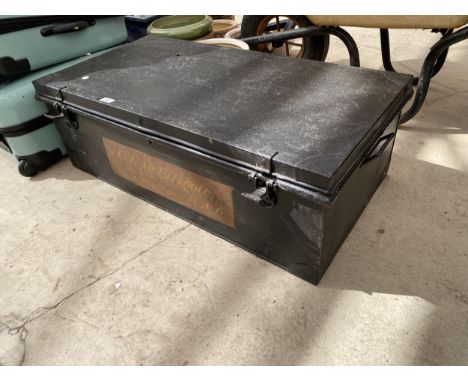 A LARGE METAL TRAVEL TRUNK 