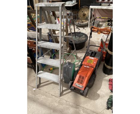 A FLYMO CHEVRON ELECTRIC LAWN MOWER, A HOSE REEL AND A FOUR RUNG ALUMINIUM STEP LADDER 