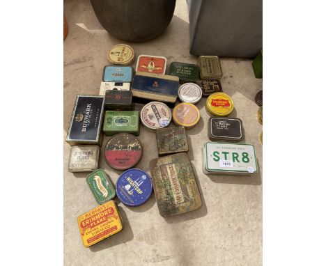 AN ASSORTMENT OF VINTAGE TINS 