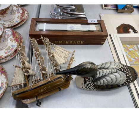 A WOODEN CRIBBAGE SET TOGETHER WITH A WOODEN DUCK AND SHIP 