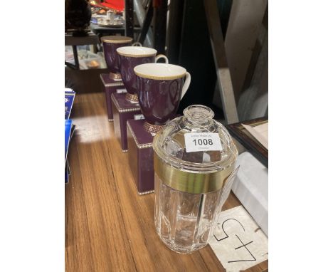 THREE NEW AND BOXED MAXWELL AND WILLIAMS 'KASBAH' PURPLE FOOTED CUPS PLUS A TEA CADDY 