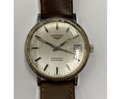 A VINTAGE LONGINES CONQUEST AUTOMATIC WRIST WATCH WITH LEATHER STRAP SEEN WORKING BUT NO WARRANTY 