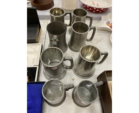 A COLLECTION OF VINTAGE PEWTER TANKARDS TO INCLUDE ONE WITH A NUDE LADY HANDLE 