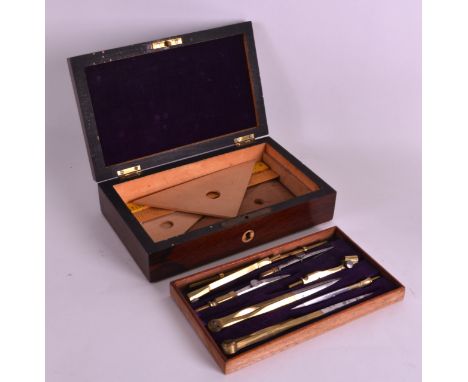 A 19TH CENTURY ROSEWOOD CASED INSTRUMENT SET with brass tipped tools. 