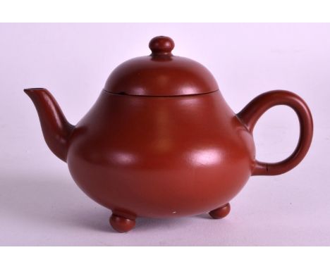  A FINE 19TH CENTURY CHINESE YIXING POTTERY TEAPOT AND COVER of small proportions, with loop handle. 4.25ins wide. 