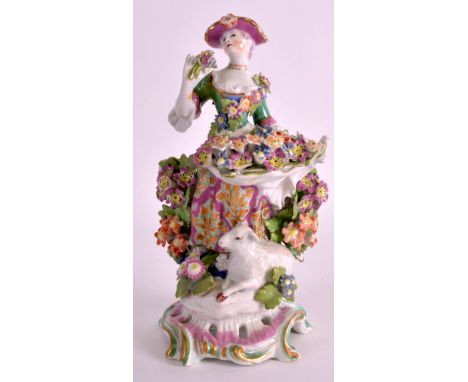 AN 18TH CENTURY BOW FIGURE OF A GIRL modelled with an apron of flowers upon a base surmounted with a lamb. 6.75ins high. 