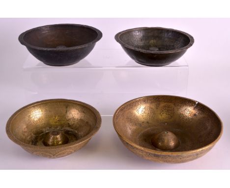 A 17TH CENTURY IRANIAN COPPER ALLOY MAGIC OR POISON BOWL Safavid, engraved all over with incised motifs and calligraphy. Larg