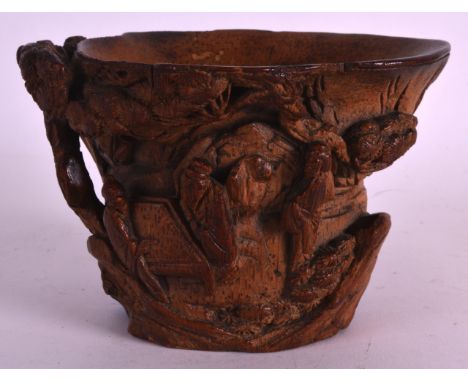 A FINE 17TH/18TH CENTURY CHINESE CARVED BAMBOO LIBATION CUP Kangxi, carved with figures and scholars within a landscape. 5ins