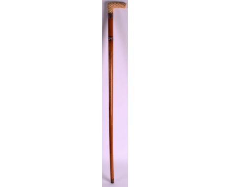 AN EARLY 20TH CENTURY GENTLEMANS IVORY AND SILVER MOUNTED SWORD STICK (unmarked) with thatch work ivory handle and engraved s