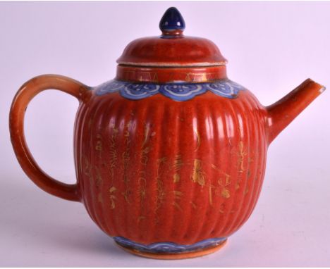 A RARE 18TH CENTURY CHINESE CORAL GROUND TEAPOT AND COVER Qianlong, highlighted in gilt with scattered foliage. 6.75ins wide.