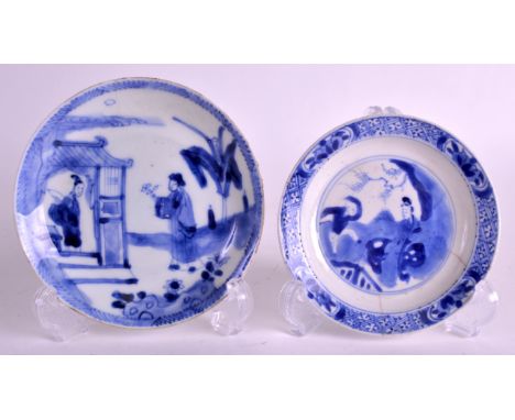 A 17TH CENTURY CHINESE BLUE AND WHITE CIRCULAR SAUCER kangxi, together with another similar. 4ins & 4.75ins diameter. (2)