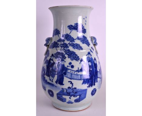 A LATE 18TH/19TH CENTURY CHINESE TWIN HANDLED HU TYPE VASE Transitional style, painted with figures painting a scroll. 1ft 1.