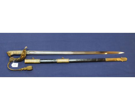 A British model 1827 Naval Officers sword with brass mounted leather scabbard and original knot, the fine condition blade mar