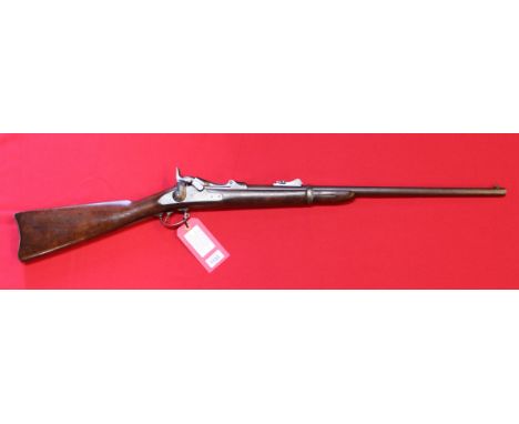 A Springfield model 1873 trapdoor carbine in .45-70 cal, S/No.73623 c1873-1877, this example seems to have been converted fro